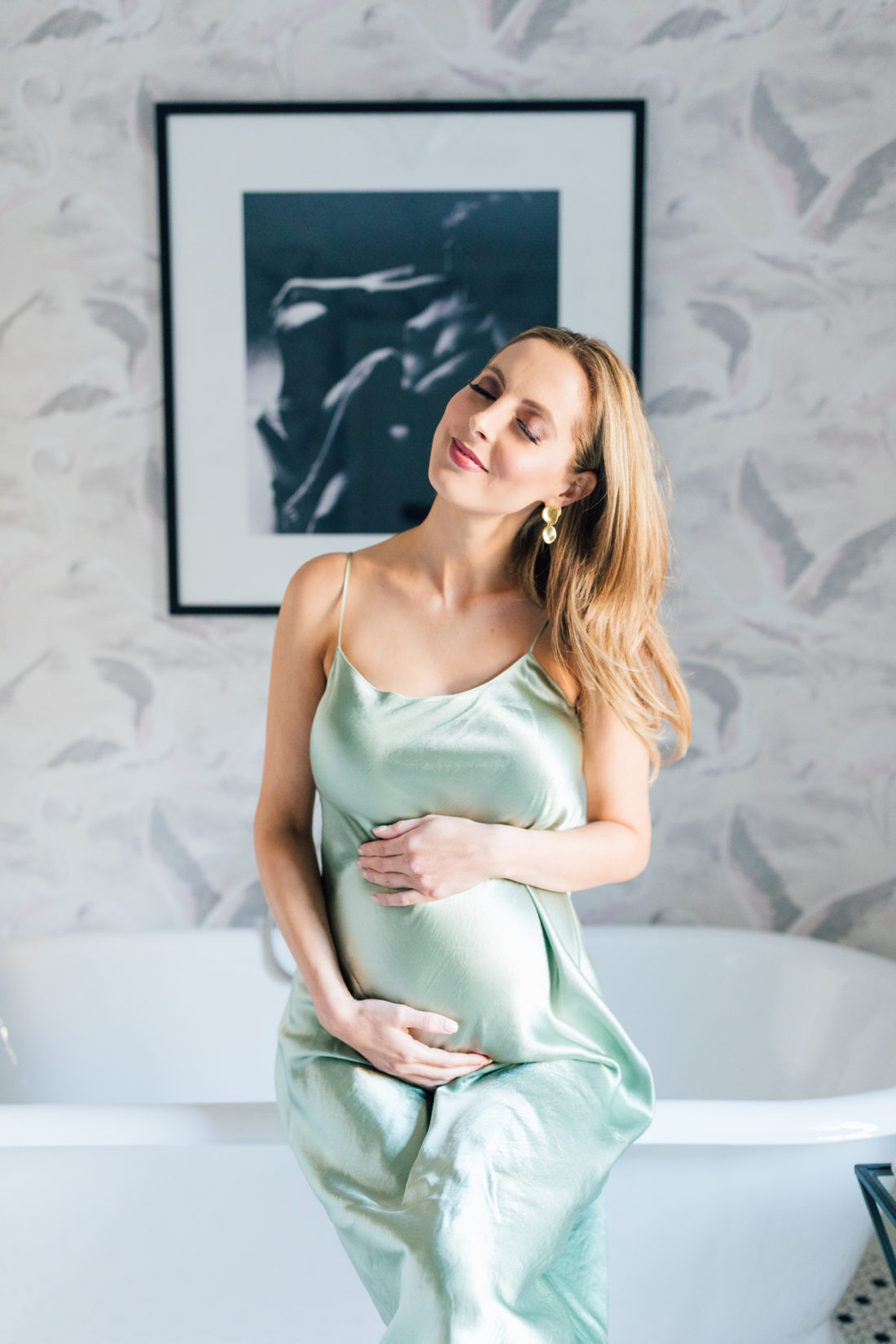 Eva Amurri Martino cradles her baby bump in a gorgeous silk dress from Verishop