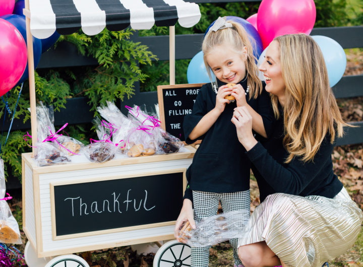 Eva Amurri Martino hugs daughter Marlowe at their bake sale benefitting nonprofit organization Filling in the Blanks