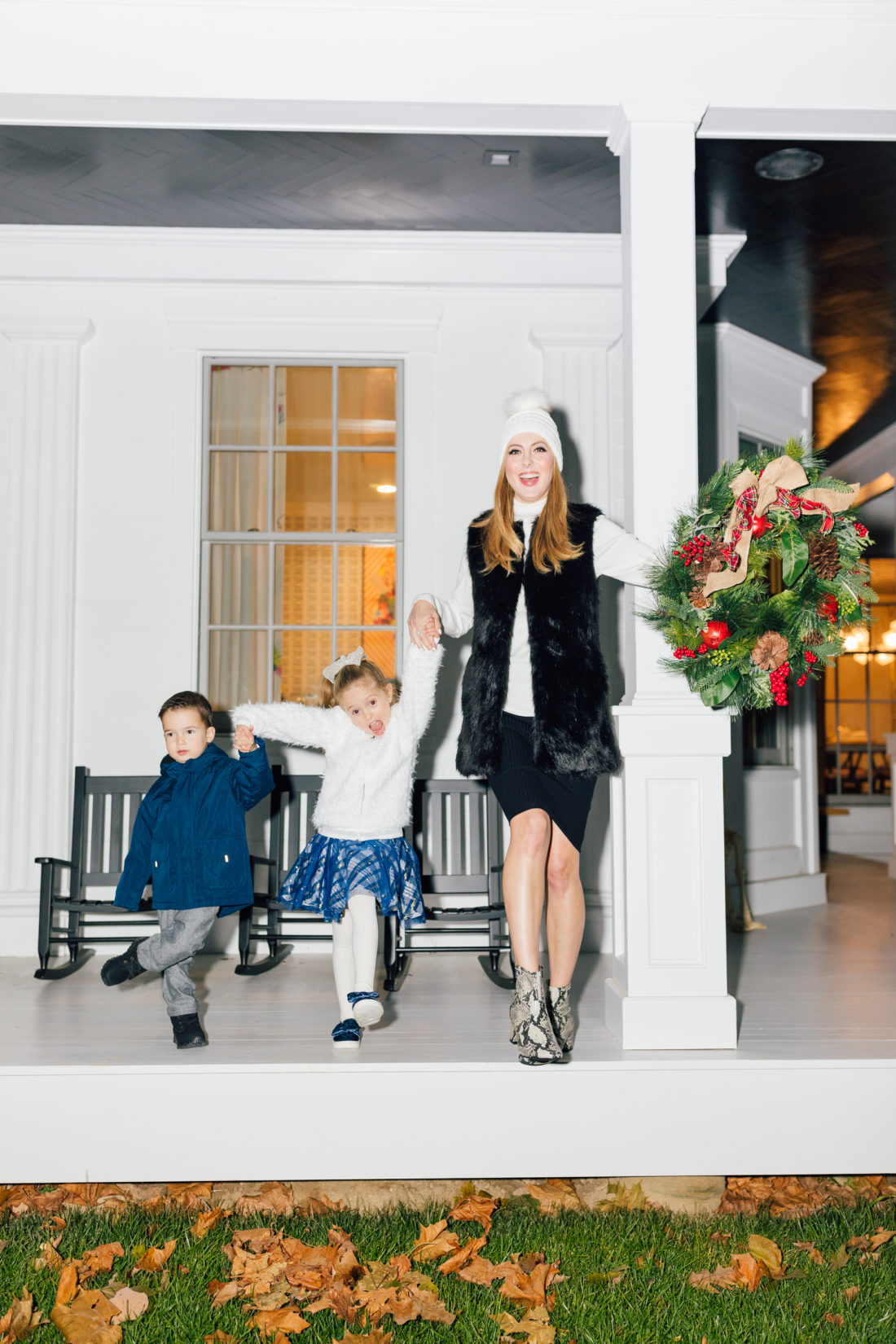 Eva Amurri and kids Marlowe and Major get ready to hang their Christmas Wreath from Walmart