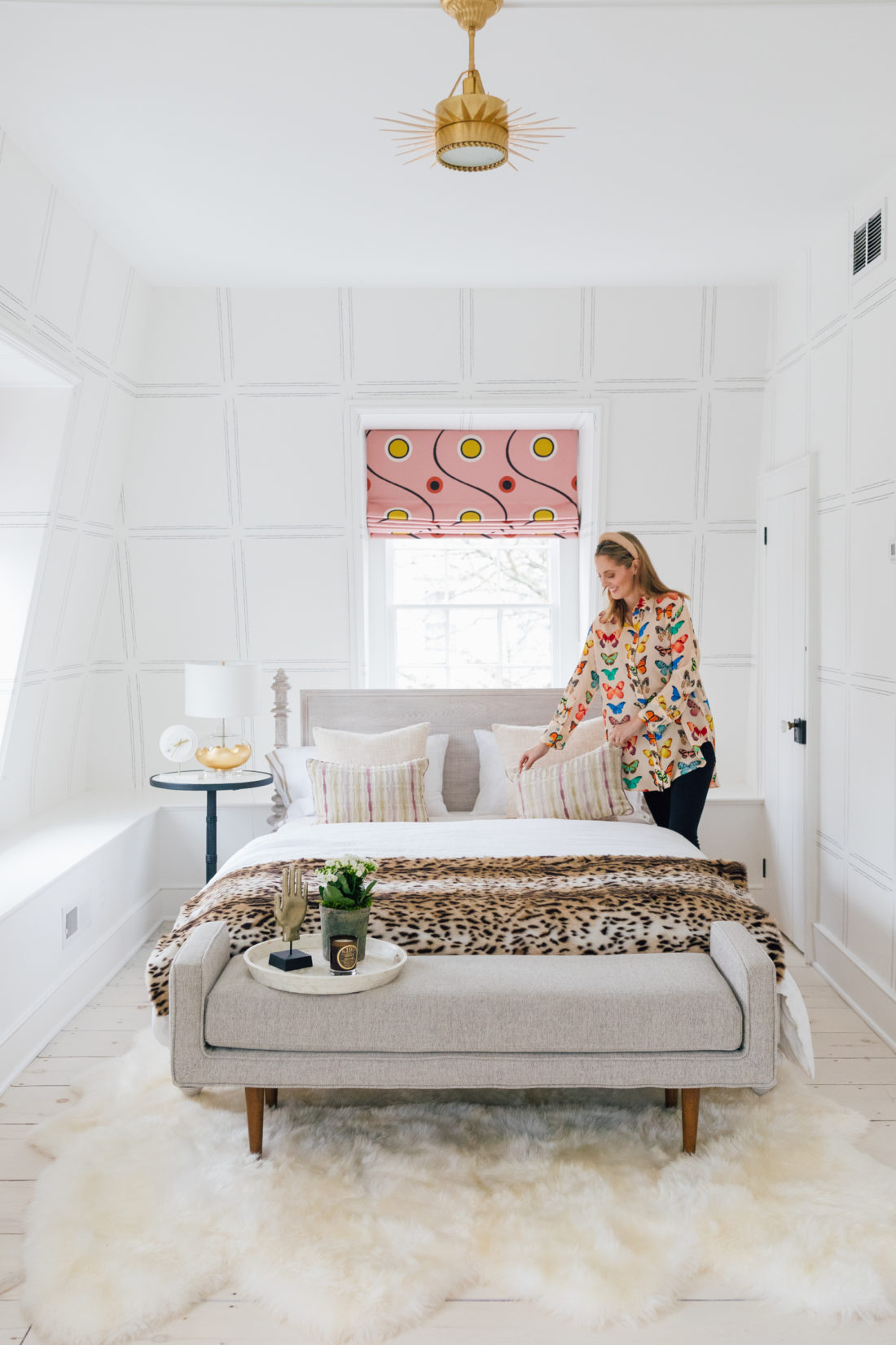 Eva Amurri plumps pillows inside her newly renovated Guest Suite