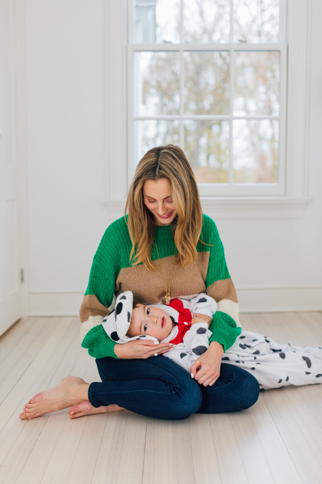 Eva Amurri hugs her son Major who is dressed in Dalmatian costumes