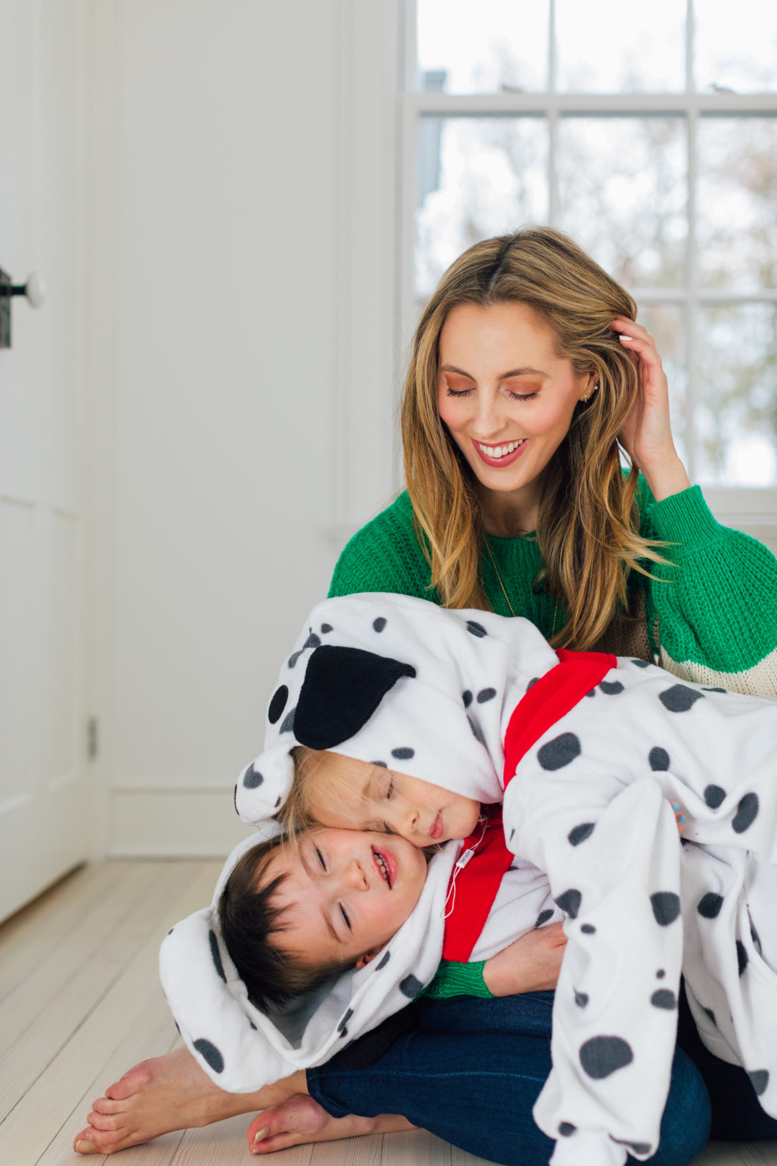 Eva Amurri hugs her kids Marlowe and Major who are dressed in Dalmatian costumes