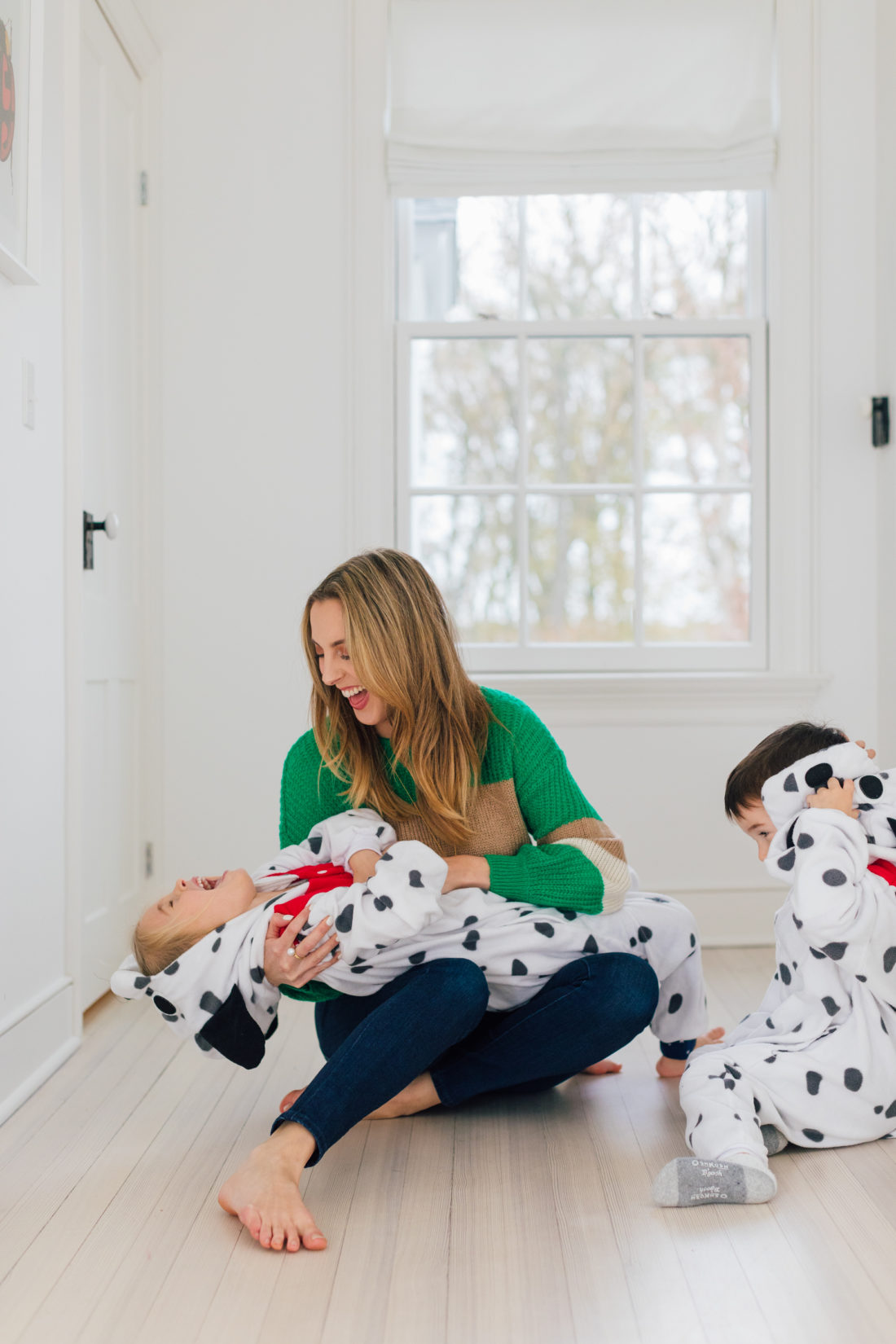 Eva Amurri hugs her kids Marlowe and Major who are dressed in Dalmatian costumes