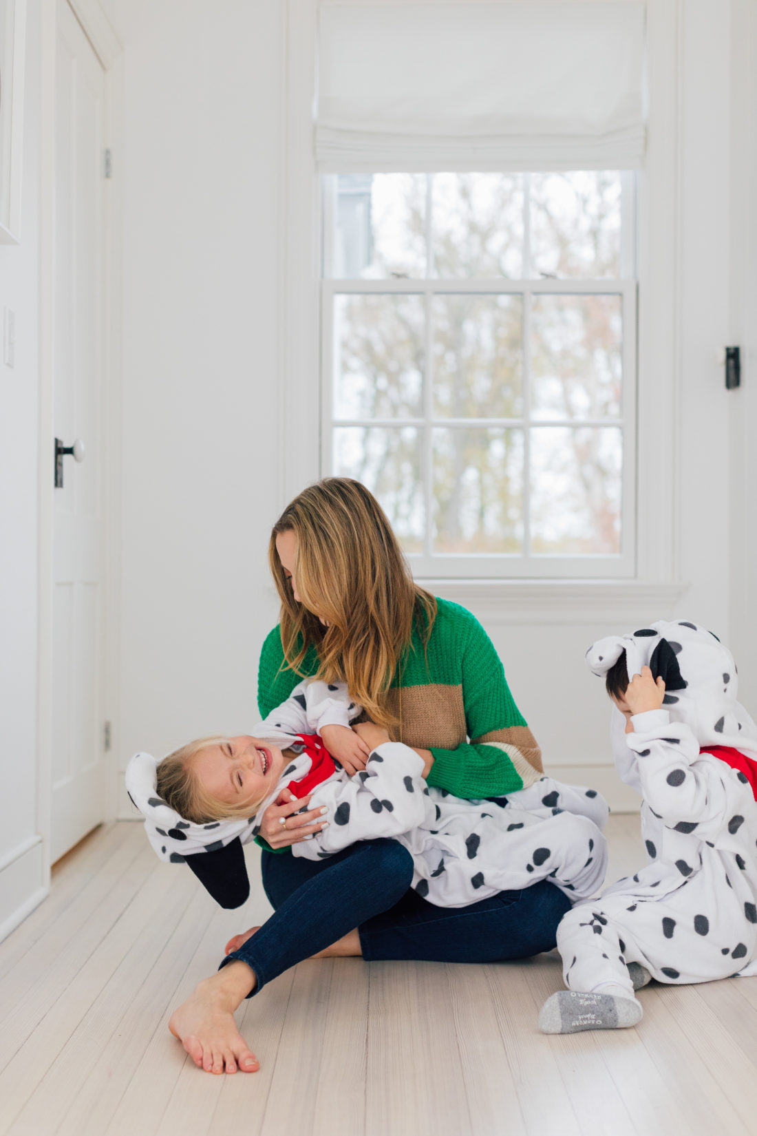 Eva Amurri hugs her kids Marlowe and Major who are dressed in Dalmatian costumes