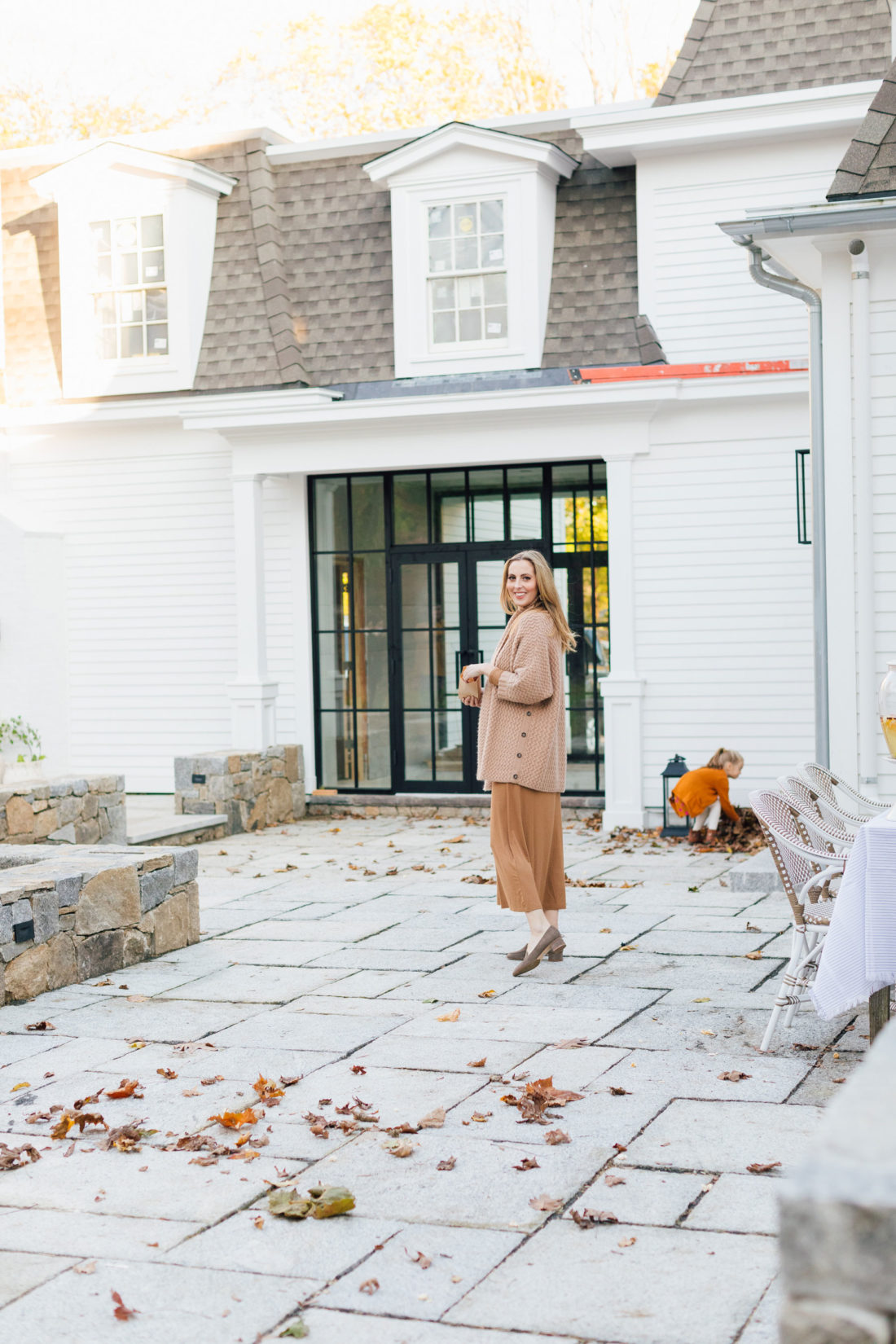 Eva Amurri prepares for an outdoor movie night on the back patio of her Connecticut home