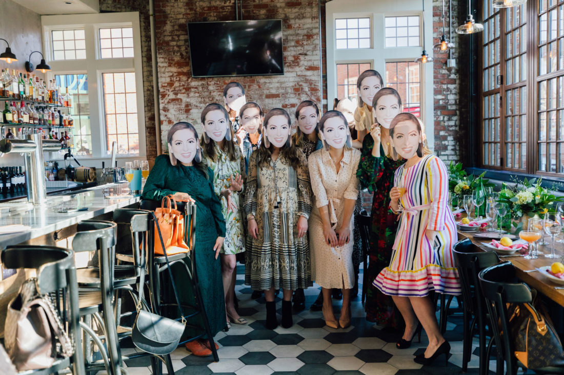 Blogger Eva Amurri's friends wearing masks of her face to surprise her at her Baby Sprinkle